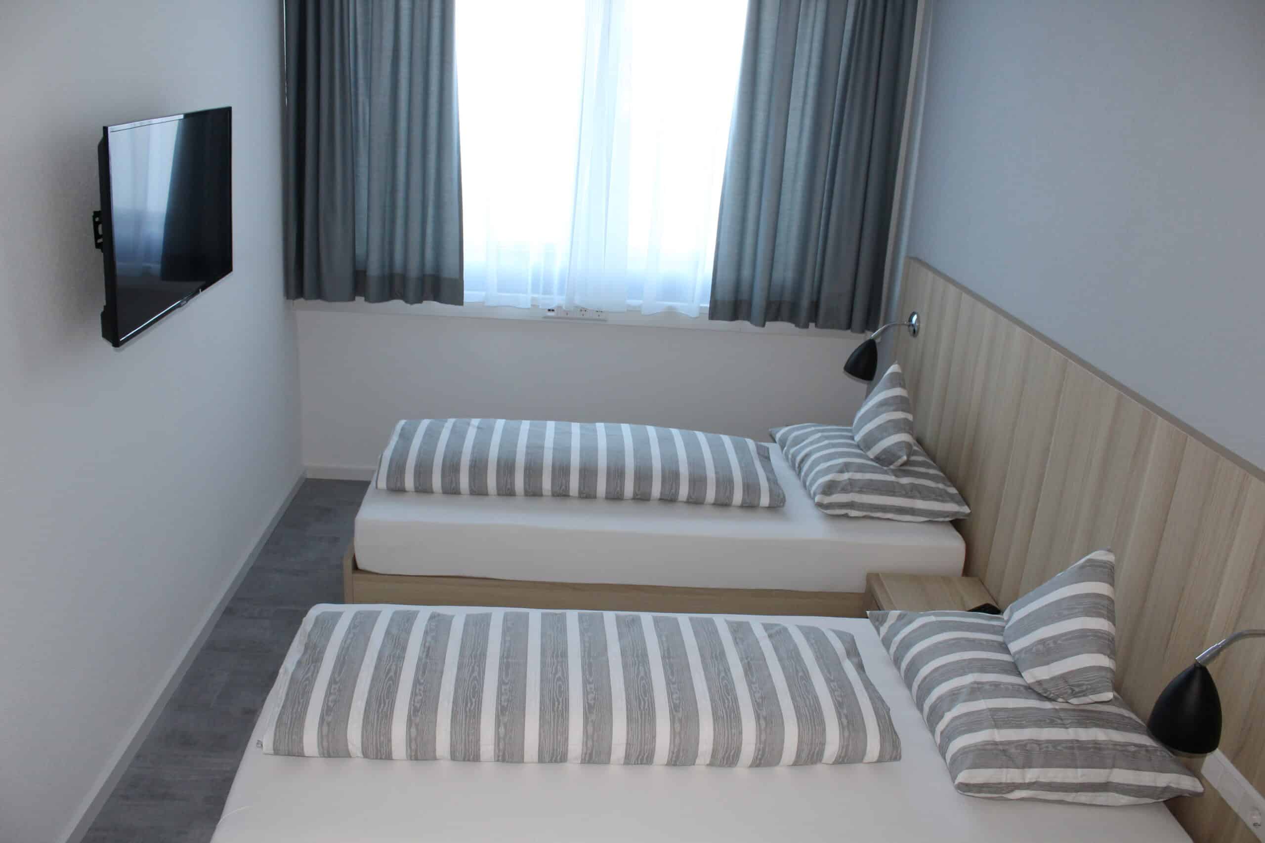 Zimmer mit zwei Einzelbetten in der Hotelsuite